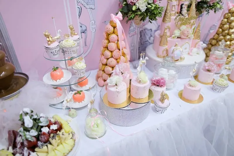 Many sweet cakes and candies on wedding table-cm (4)
