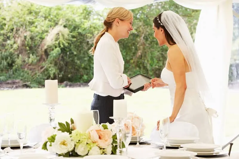 Bride With Wedding Planner In Marquee-cm